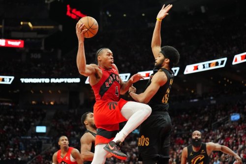 Toronto Raptors forward Scottie Barnes (4) jumps towards the basket as Cleveland Cavaliers centre Jarrett Allen (31) defends during second half NBA playoff basketball action in Toronto on Sunday, April 26, 2026. THE CANADIAN PRESS/Frank Gunn