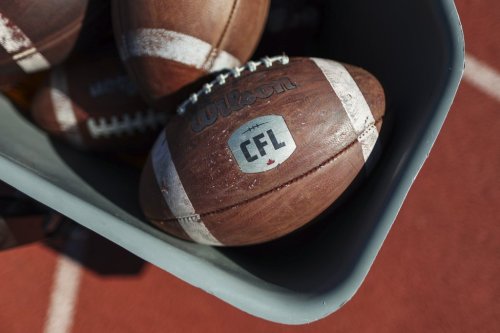 Canadian Football League logo on a football at opening day of CFL training camp in Guelph, Ont., on Sunday, May 11, 2025. THE CANADIAN PRESS/Nick Iwanyshyn