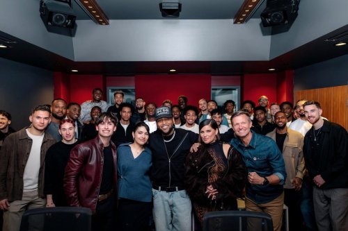 Boi-1da, Nelly Furtado and Alessia Cara pose with members of Canada's men's national soccer team in this undated handout photo. THE CANADIAN PRESS/Handout - Canada Soccer(Mandatory Credit)