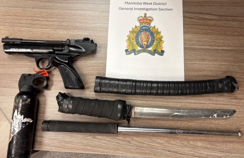 Dauphin suspect emerges from hidden room
