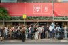 Journalists gather outside the headquarters of Spain's ruling Socialist Party as police search the building in Madrid, Wednesday, May 27, 2026. (AP Photo/Bernat Armangue)