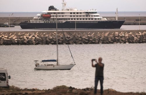 The hantavirus-stricken cruise ship MV Hondius is seen at anchor at the port of Granadilla in Tenerife, Canary Islands, Spain, Monday, May 11, 2026. (AP Photo/Arturo Rodriguez)