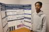Vincent Massey High School Grade 9 student Abereham Moges stands by his project, &ldquo;Selective Synergy in Melanoma Drugs&rdquo; in the school on Friday afternoon. Moges was named Best of Fair at the 56th annual Western Manitoba Science Fair (WMSF) last month and received an all-expenses-paid trip to represent Western Manitoba at the Canada Wide Science Fair 2026 in Edmonton on May 23-30. 
                                (Photos by Abiola Odutola/The Brandon Sun)