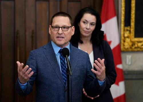 NDP Leader Avi Lewis responds to the spring economic update, with NDP MP Heather McPherson, in the Foyer of the House of Commons on Parliament Hill, in Ottawa, on April 28. The NDP made a motion to ban &ldquo;surveillance pricing&rdquo; but it was voted down by the Liberals and Conservatives. (The Canadian Press files)