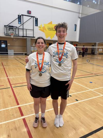 Neelin&rsquo;s Dana Linov, left, and Leonides McDaniel won the varsity mixed doubles championship at the 2026 high school badminton provincials. (Submitted)