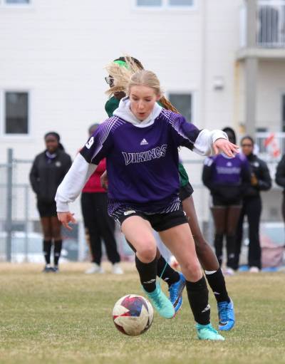 Vincent Massey centre back Jordan Woloski dribbles the ball against Neelin during Brandon High School Soccer League girls action at Massey on Tuesday. (Thomas Friesen/The Brandon Sun)
