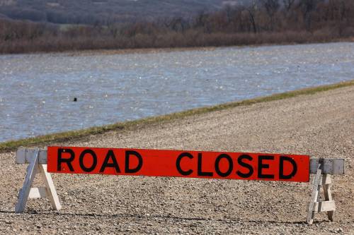 Floodwater from the Assiniboine River covers land bordering Highway 250 north of Alexander on Tuesday. (Tim Smith/The Brandon Sun)