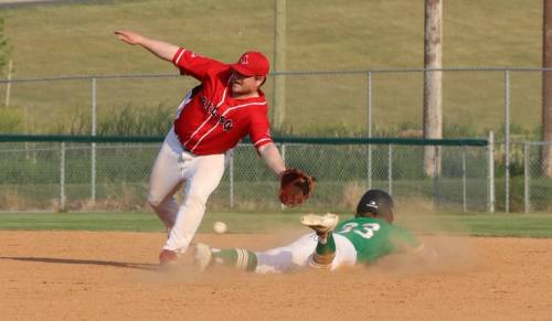 Brandon Young Guns base runner Kieran Madill dives safely for a stolen base as Hamiota Red Sox second baseman Patrick Vandoorne tries to corral a bouncing throw from the plate during South West Baseball League action at Andrews Field on July 2, 2025. The Young Guns made their debut in the league last summer after the Brandon league folded. (Perry Bergson/The Brandon Sun)