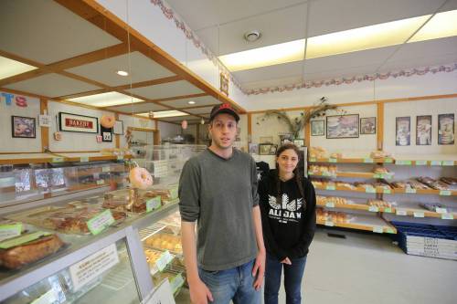 Cody and Kendra Minary, co-owners of the Minary Homestyle Bakery, are seen in their shop in Souris on Wednesday. The siblings have taken over the bakery with their brother, Adam, following the sudden and unexpected death of their parents, Cindy and Darwyn, this spring. (Connor McDowell/The Brandon Sun)
