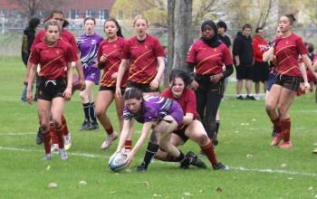 Maria Matthies of the Vincent Massey Vikings, touches down the ball for one of her five tries in Westman High School Rugby girls' action on Friday afternoon. Massey won 71-0 to claim the Townsend Shield. (Perry Bergson/The Brandon Sun) May 22, 2026