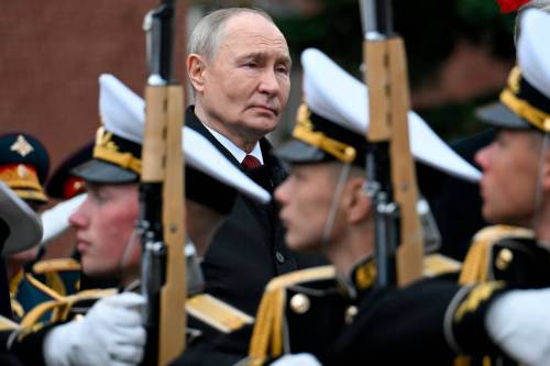 Russian President Vladimir Putin (rear, centre) attends a ceremony to lay flowers at the Tomb of the Unknown Soldier by the Kremlin wall in Moscow on May 9 during celebrations of the 81st anniversary of the Soviet Union&rsquo;s victory over Nazi Germany during the Second World War. (The Associated Press files)