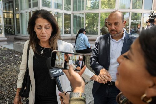 FILE - Nancy Iskander, left, holding the hand of her husband, Karim, leaves Van Nuys Courthouse June 10, 2024, in Van Nuys, Calif., after attending the sentencing hearing in the murder trial of Rebecca Grossman, who is charged in the deaths of their two sons, Mark, 11, and Jacob, 8. (AP Photo/Damian Dovarganes, File)