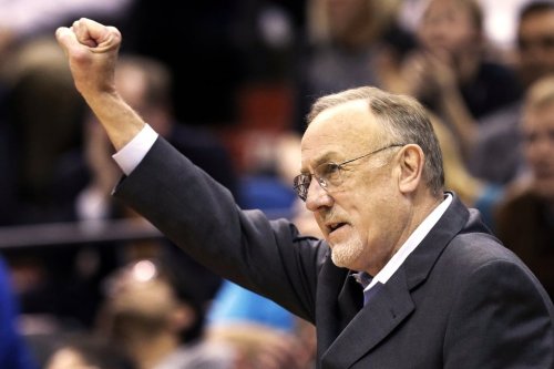 FILE — Minnesota Timberwolves head coach Rick Adelman celebrates a defensive rebound by Ricky Rubio in the second half of an NBA basketball game against Oklahoma City Thunder, March 29, 2013, in Minneapolis. (AP Photo/Jim Mone, File)