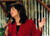 Television evangilist Joni Lamb sings a praise song during 'Celebration', a show that she and her husband Marcus host on the Daystar Network, on July 30, 2001 in Colleyville, Texas. (Lawrence Jenkins/The Dallas Morning News via AP)