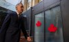 Prime Minister Mark Carney leaves after speaking with the media at the Canadian Embassy in Paris, France on Tuesday, Jan. 6, 2026. THE CANADIAN PRESS/Christinne Muschi