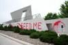 The words 'FEED ME' are seen painted in red on the National Holocaust Monument in Ottawa on Monday, June 9, 2025. THE CANADIAN PRESS/Sean Kilpatrick