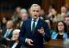 Prime Minister Mark Carney rises during Question Period in the House of Commons on Parliament Hill in Ottawa on Tuesday, May 26, 2026. THE CANADIAN PRESS/Justin Tang