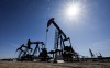 A pumpjack draws out oil and gas from a well head near Calgary, Alta., Tuesday, May 6, 2025. Canada has the third largest oil reserves in the world and is the world's fourth largest oil producer. THE CANADIAN PRESS/Jeff McIntosh
