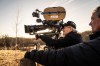 This image released by Universal Pictures shows director Steven Spielberg, center, on the set of 