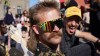 An attendee at Denmark's Mullet Championship looks on in Copenhagen, Saturday, June 6, 2026. (AP Photo/James Brooks)