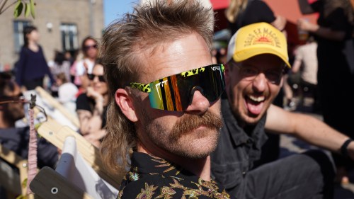 An attendee at Denmark's Mullet Championship looks on in Copenhagen, Saturday, June 6, 2026. (AP Photo/James Brooks)