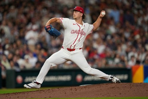 Canada pitcher Adam Macko delivers a pitch against the United States during the sixth inning of a World Baseball Classic quarterfinal game, Friday, March 13, 2026, in Houston. (AP Photo/David J. Phillip)