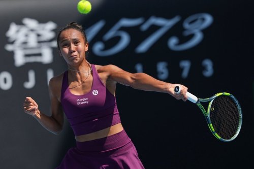 FILE -- Leylah Fernandez of Canada plays a forehand return to Janice Tjen of Indonesia during their first round match at the Australian Open tennis championship in Melbourne, Australia, Tuesday, Jan. 20, 2026. (AP Photo/Dar Yasin)