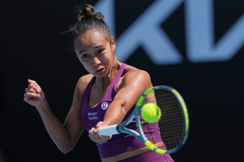 Leylah Fernandez of Canada plays a forehand return to Janice Tjen of Indonesia during their first round match at the Australian Open tennis championship in Melbourne, Australia, Tuesday, Jan. 20, 2026. (AP Photo/Dar Yasin)