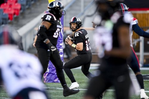 Ottawa Redblacks quarterback Jake Maier (13) looks for a pass against the Montreal Alouettes during first half CFL pre-season action in Ottawa, on Friday, May 29, 2026. THE CANADIAN PRESS/Spencer Colby