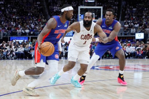 Detroit Pistons guard Caris LeVert (8) drives to the basket against Cleveland Cavaliers guard James Harden (1) with Pistons centre Jalen Duren, right, helping on the play during the first half in Game 7 of a second-round NBA playoffs basketball series Sunday, May 17, 2026, in Detroit. (AP Photo/Duane Burleson)