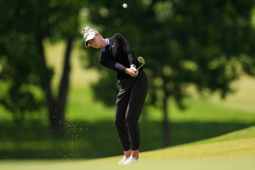 Nelly Korda plays a shot on the 13th hole during the first round of the Queen City Championship LPGA golf tournament at Maketewah Country Club, Thursday, May 14, 2026, in Cincinnati. (AP Photo/Jeff Dean)
