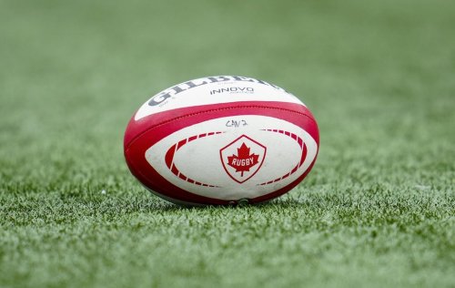 A Team Canada rugby ball sits on the turf before a men's match between Scotland and Canada in Ottawa on Saturday, July 6, 2024. THE CANADIAN PRESS/Sean Kilpatrick