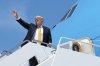 President Donald Trump boards Air Force One Tuesday, May 12, 2026, at Joint Base Andrews, Md., for a trip to China. (AP Photo/Mark Schiefelbein)