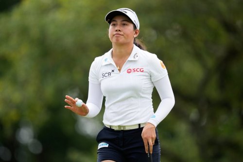 Jeeno Thitikul, of Thailand, waves after making a putt on the 13th hole during the second round of the Chevron Championship LPGA golf tournament Friday, April 24, 2026, in Houston. (AP Photo/Ashley Landis)