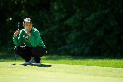 Chella Choi looks over the sixth green during the first round of the Queen City Championship LPGA golf tournament at Maketewah Country Club, Thursday, May 14, 2026, in Cincinnati. (AP Photo/Jeff Dean)
