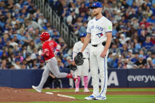 Toronto Blue Jays pitcher Eric Lauer looks on as Los Angeles Angels second baseman Oswald Peraza (2) rounds the bases after hitting a two run home run during the top of the fifth inning MLB baseball action in Toronto on Sunday, May 10, 2026. THE CANADIAN PRESS/Frank Gunn