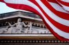 FILE - An American flag flies outside the Department of Justice in Washington, March 22, 2019. (AP Photo/Andrew Harnik, File)