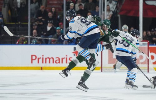 Chicoutimi Sagueneens' Mavrick Lachance (93) and Everett Silvertips' Jaxon Pisani (43) collide during the first period of the Memorial Cup semifinal hockey game, in Kelowna, B.C., on Friday, May 29, 2026. THE CANADIAN PRESS/Darryl Dyck