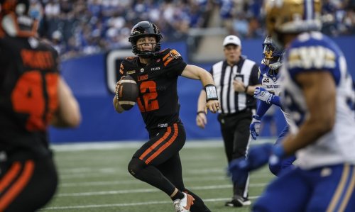 B.C. Lions quarterback Nathan Rourke (12) runs against the Winnipeg Blue Bombers during first half CFL pre-season football action in Winnipeg on Friday, May 29, 2026. THE CANADIAN PRESS/John Woods
