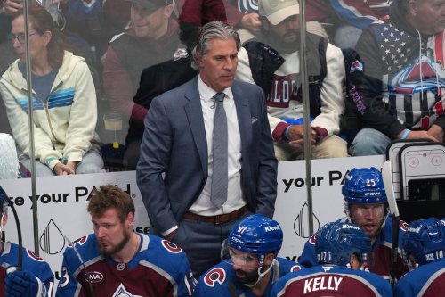 Colorado Avalanche head coach Jared Bednar looks on during the first period in Game 1 of the Western Conference finals NHL hockey Stanley Cup playoff series against the Vegas Golden Knights Wednesday, May 20, 2026, in Denver. (AP Photo/David Zalubowski)