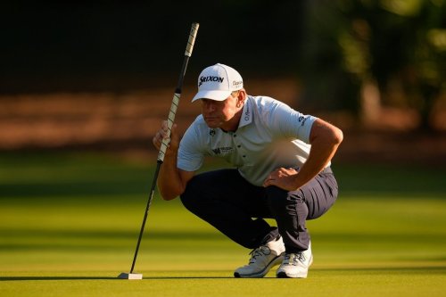 Lucas Glover lines up his putt on the second green during the first round at the RBC Heritage golf tournament, Thursday, April 16, 2026, in Hilton Head Island, S.C. (AP Photo/Mike Stewart)