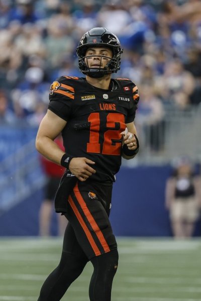 B.C. Lions quarterback Nathan Rourke (12) looks up at the scoreboard against the Winnipeg Blue Bombers during first half CFL pre-season football action in Winnipeg on Friday, May 29, 2026. THE CANADIAN PRESS/John Woods
