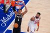 San Antonio Spurs forward Victor Wembanyama (1) dunks as New York Knicks center Karl-Anthony Towns (32) looks on during the second half of Game 3 of the NBA Finals basketball series, Monday, June 8, 2026, in New York. (AP Photo/Yuki Iwamura)
