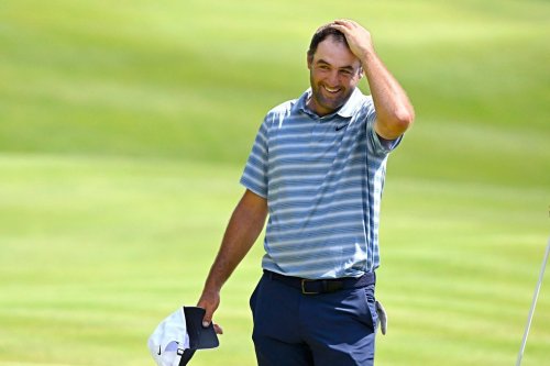 Scottie Scheffler reacts after finishing the second round of the Travelers Championship golf tournament at TPC River Highlands, Friday, June 26, 2026, in Cromwell, Conn. (AP Photo/Jessica Hill)