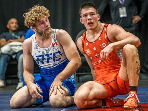 Brandon&rsquo;s Taras Fisun and Xavier Lauzon of Montreal sit together during the final. (Walter Howor Photo)