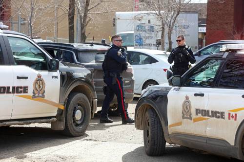 Brandon Police Service members converge on a vehicle in downtown Brandon earlier this year. Deveryn Ross writes that when we feel overwhelmed by police reports, we shouldn&rsquo;t look back on the past with too much nostalgia, since &ldquo;it&rsquo;s possible that the level of criminal activity in Brandon today is really no worse, and possibly less severe, than it was three or four decades ago.&rdquo; (Tim Smith/The Brandon Sun files)