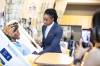 Health Minister Uzoma Asagwara demonstrates a blood-pressure check in a simulation lab after announcing new nursing training seats at Université de Saint Boniface on May 13. (Mikaela MacKenzie/Winnipeg Free Press files)