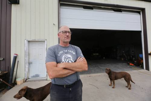 Shawn Klippenstein, a farmer near MacGregor, stands in front of his shop where cameras were installed as a response to burglary. Other steps he&rsquo;s taken include adding sensors to the property that send an alert when vehicles arrive and installing GPS trackers in equipment. (Connor McDowell/The Brandon Sun)