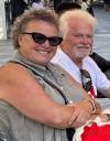Michele and Ron Poole climbed on the roof of their bungalow near Swan River and watched as water surrounded the property and entered the home. (Supplied)
