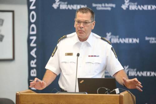 Brandon Police Service Chief Tyler Bates gives his report to the Brandon Police Board on Friday afternoon in council chambers at Brandon City Hall. (Matt Goerzen/The Brandon Sun)